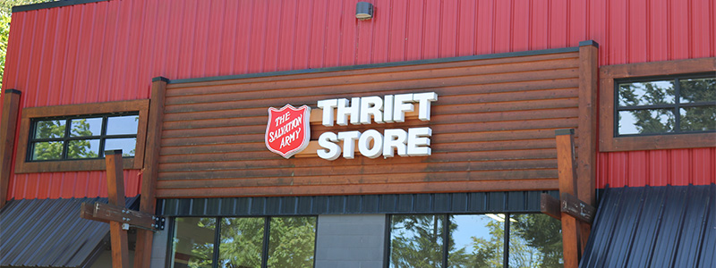 Exterior of the Salvation Army thrift store building with the Thrift Store sign displayed.